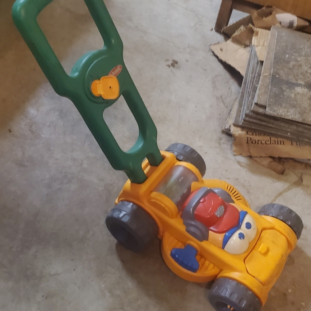 Vibrant Kids' Push Toy Mower